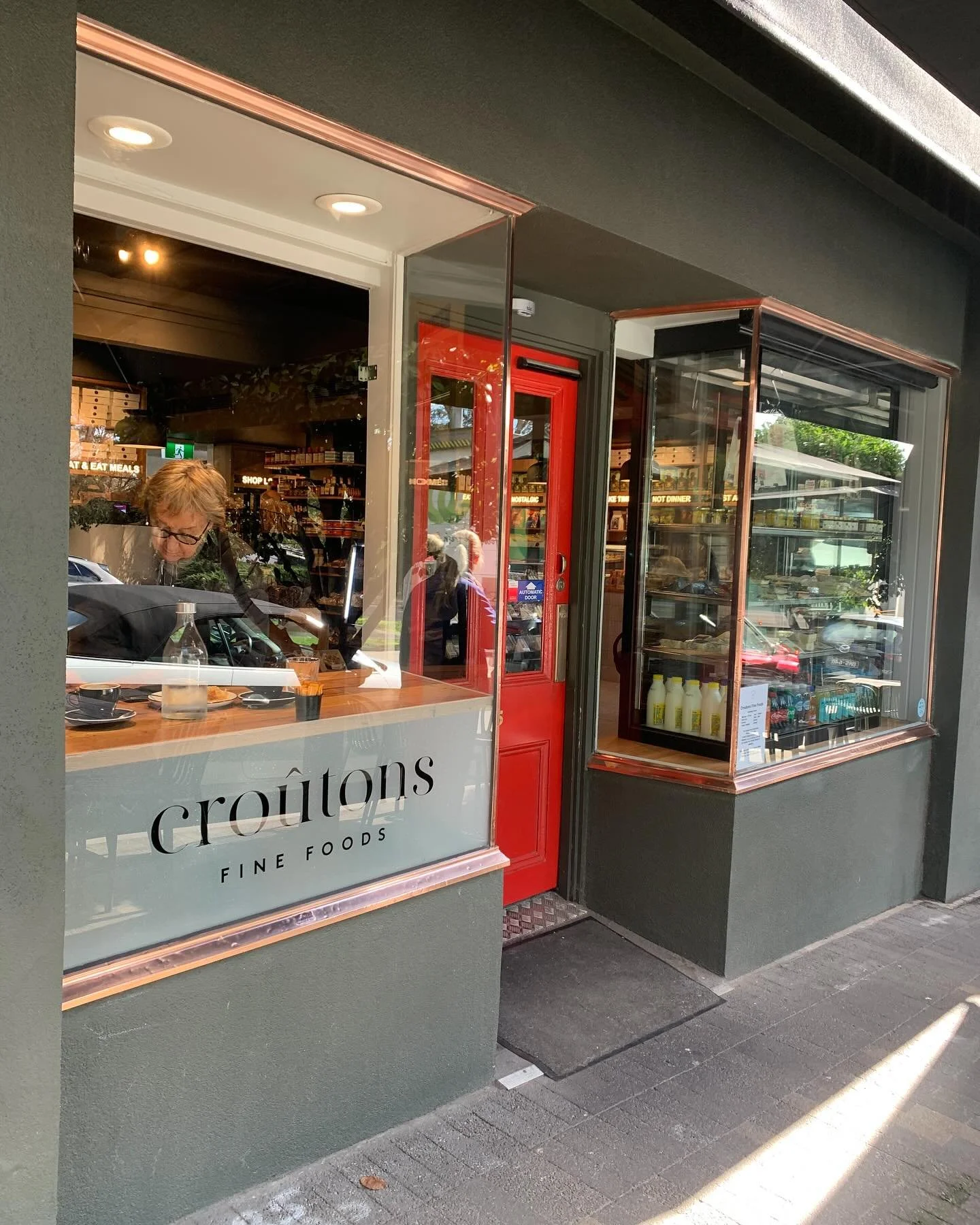 This is the newly restored Croutons in Glenferrie Rd Kooyong , which was out of action for a year, after a fire. David, the owner, invited us to restore and protect the shine on his beautiful copper shopfront. Croutons has been providing exceptional 