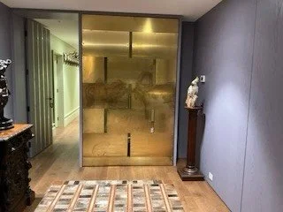 This internal brass door was exquisite when first installed, but it had no protection from marks and grime. Using our six part system Paul and I were able to restore and then protect the door with an epoxy coating. No more marks or fingerprints
