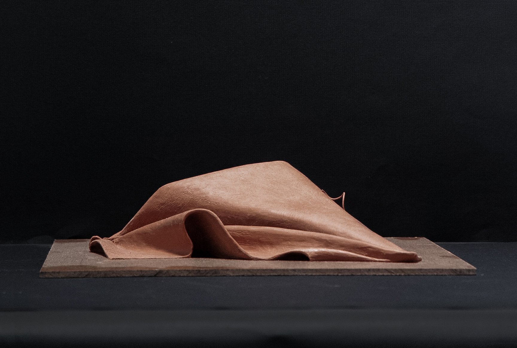 A Piece of Red, 2.5" x 8" x 8", Oil-based clay, 2024