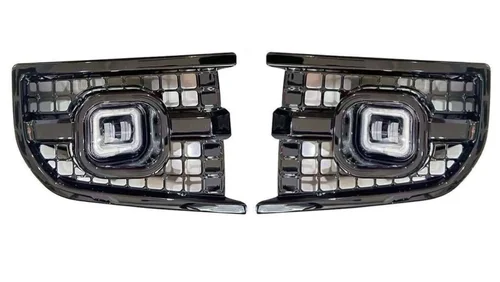 Pair of vented daytime running light surrounds for the Land Rover Defender