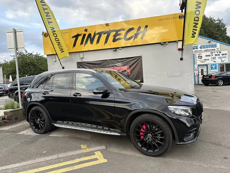 Black Mercedes GLC with black alloy wheels and red calipers outside TintTech Nottingham