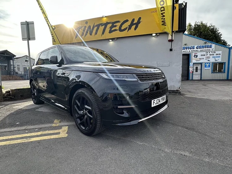Black Range Rover with black alloy wheels outside TintTech Nottingham