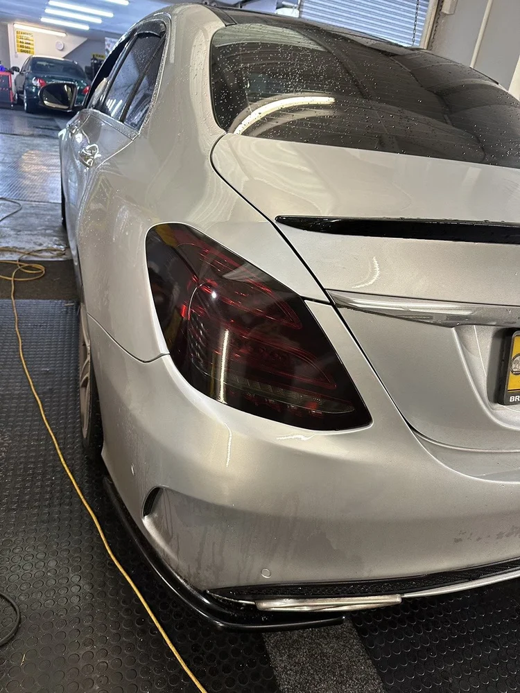 Silver Mercedes saloon with freshly tinted tail lights at TintTech Nottingham