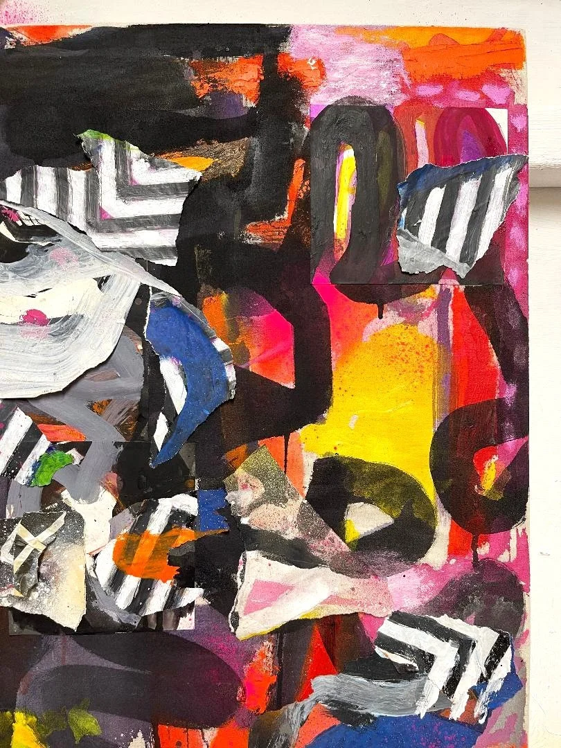 An abstract painting with bold black and colorful shapes, including orange, pink, yellow, blue, and white, arranged in a chaotic composition.