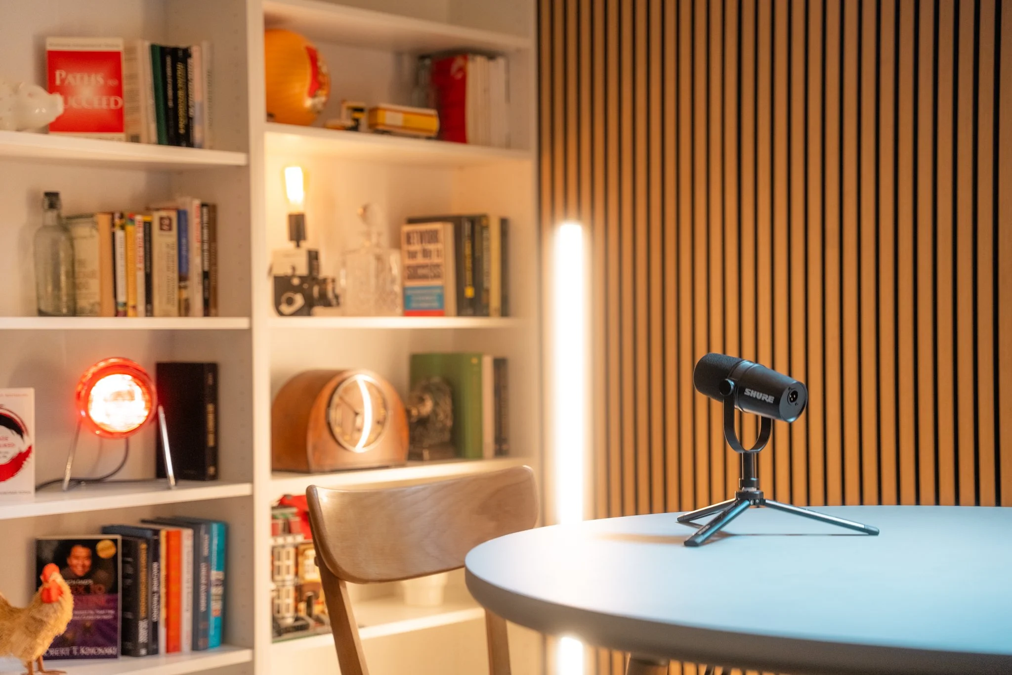 Two people recording a video podcast at Cheshire Podcast Studio in Bowdon, Altrincham, lit with cinematic studio lighting