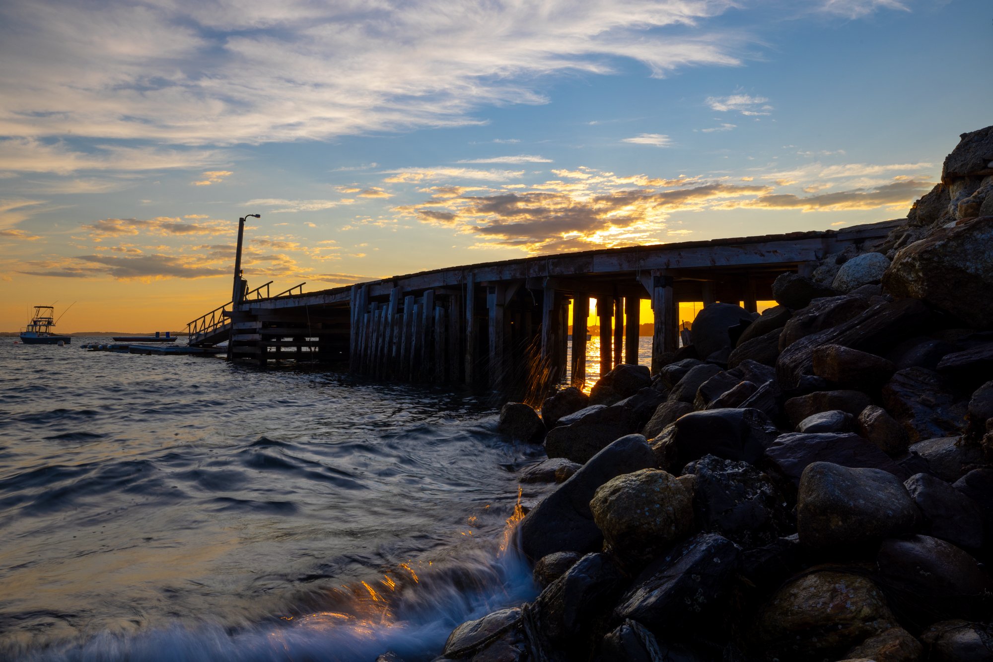 Sunset light rays through Pier.