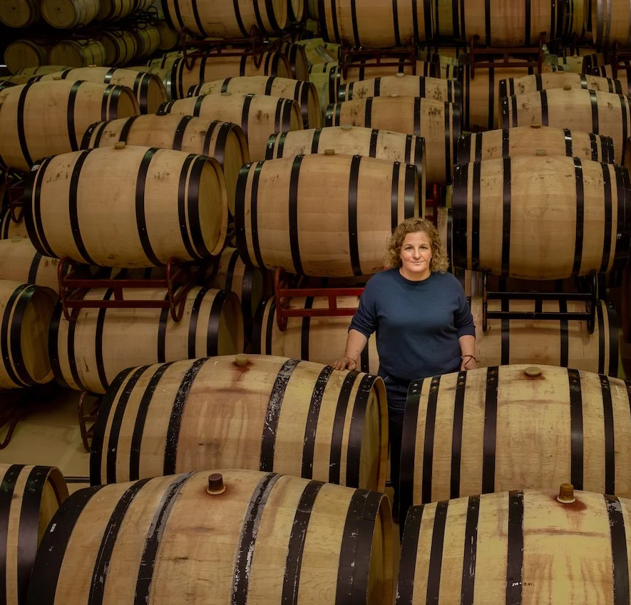 Bárbara Palacios with French oak barrels in the Casa La Rad winery
