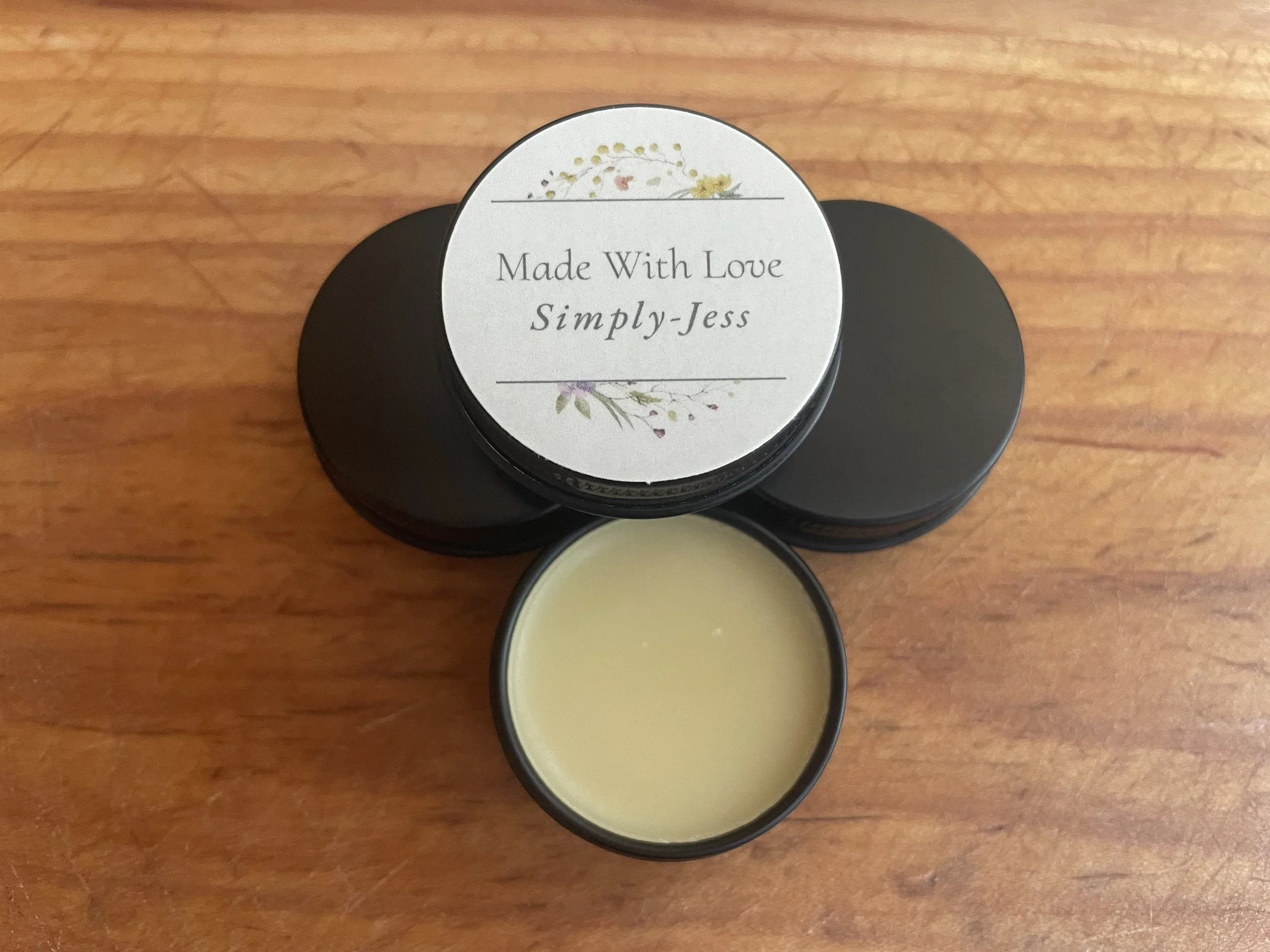 Pucker Up Buttercup $5.00
A nourishing alternative to your typical lip balm. Crafted with Maine beeswax, organic cocoa or shea butter, coconut oil, and healing essential oils, it deeply moisturizes and protects your lips—naturally. Gentle enough for