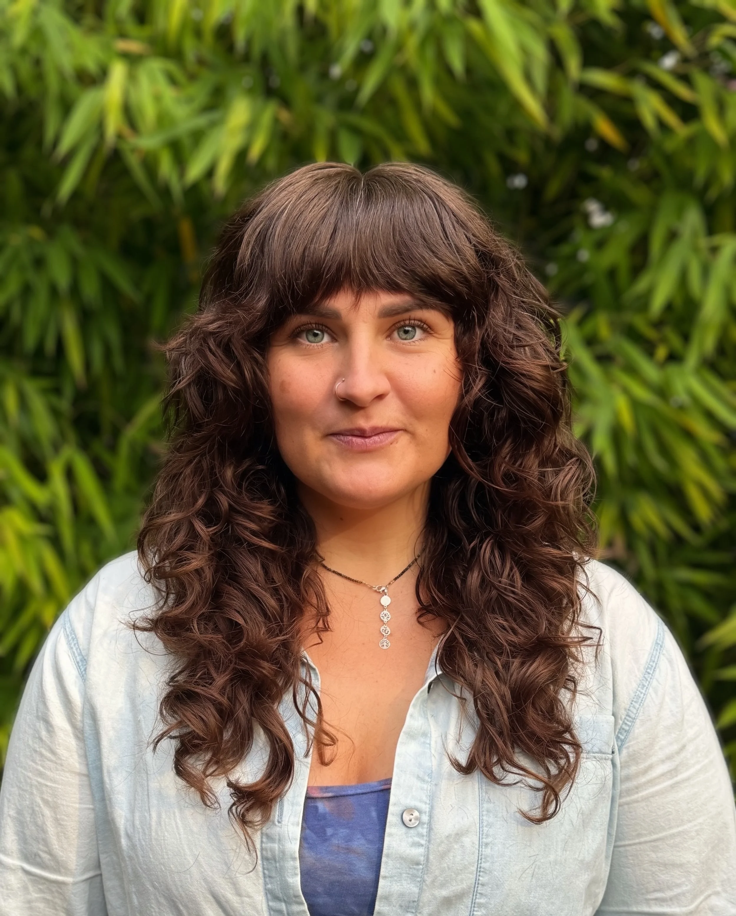 A beautiful wavy shag by @l.a.d.y.fingers ✂️ Soft bangs, shaggy layers, and so much movement. Such a great shape for thick hair&mdash;taking out weight while letting those waves shine.

Sara does both cutting and coloring and is in the salon Sunday, 