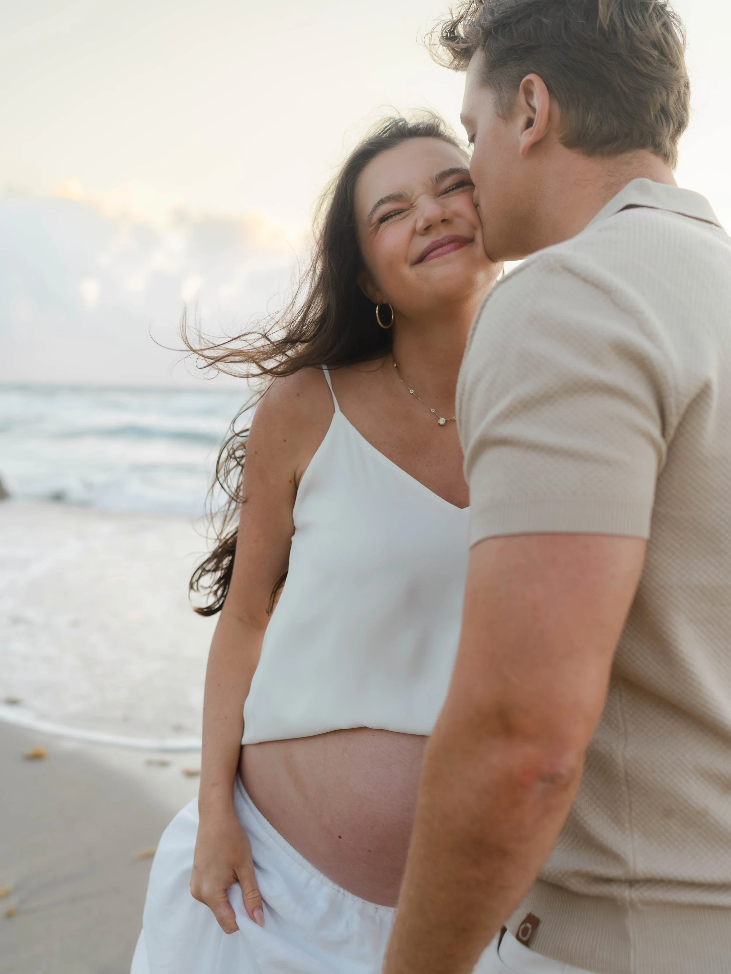 Salty kisses, sandy toes, and a beautiful new beginning on the horizon! Sunrise sessions are always worth the early alarm, this sift glowy light is magical! Can&rsquo;t wait to meet baby girl!!