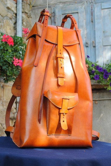Structured leather backpack created in a weeklong leatherworking workshop offered by Concentric Travel, where participants design and build their own pieces.