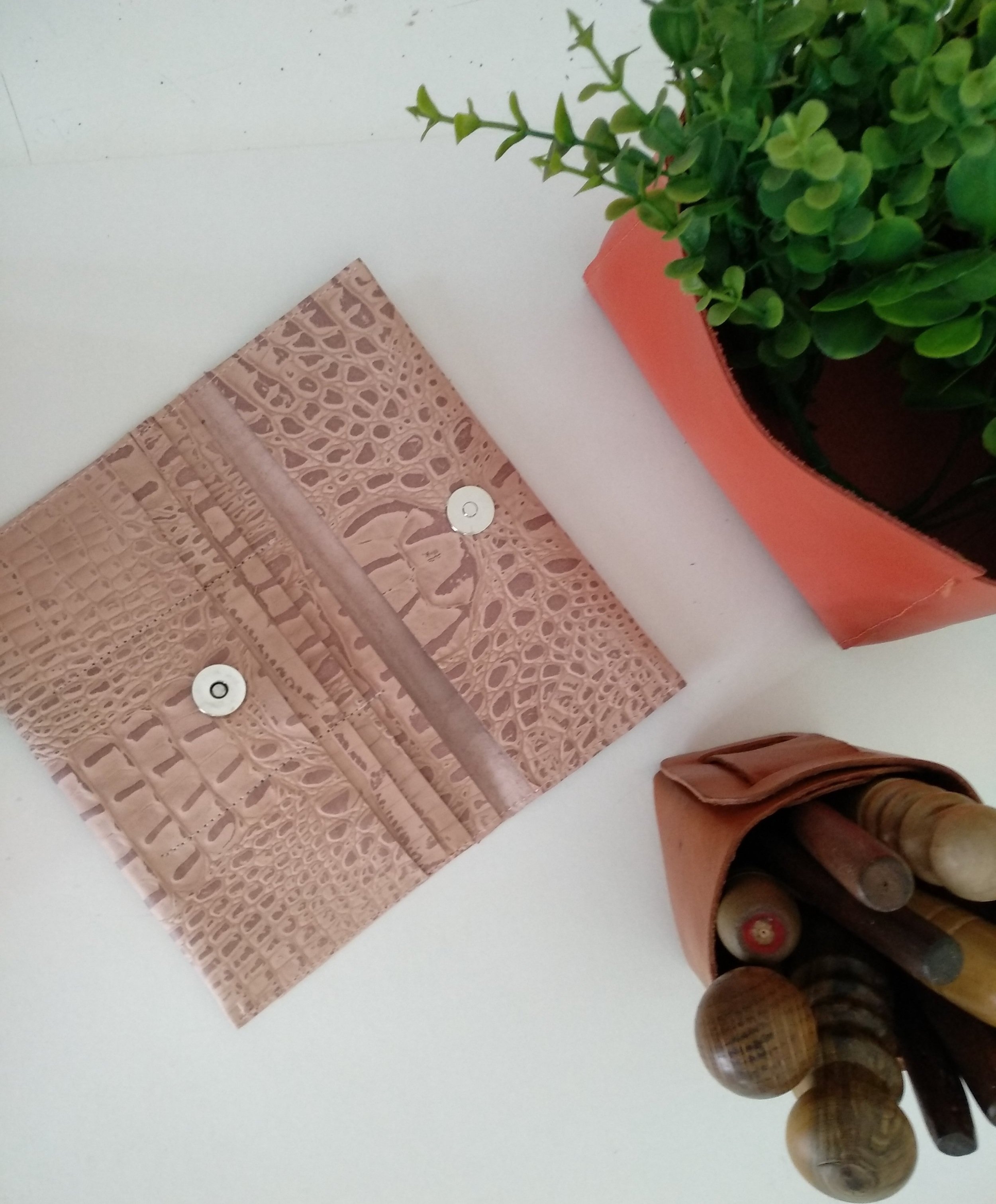 Leather cardholder crafted by a workshop participant in a Concentric Travel leather workshop in Argentina.