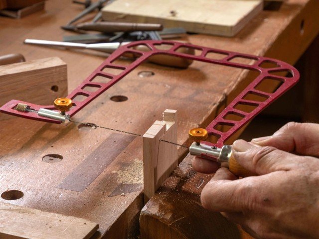 woodworking-hands-sawing-workshop-spain (Small).jpeg