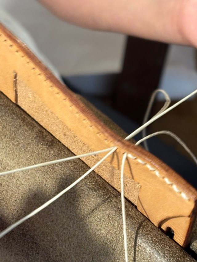 student-stitching-leather-in-artisan-workshop (Small).jpg