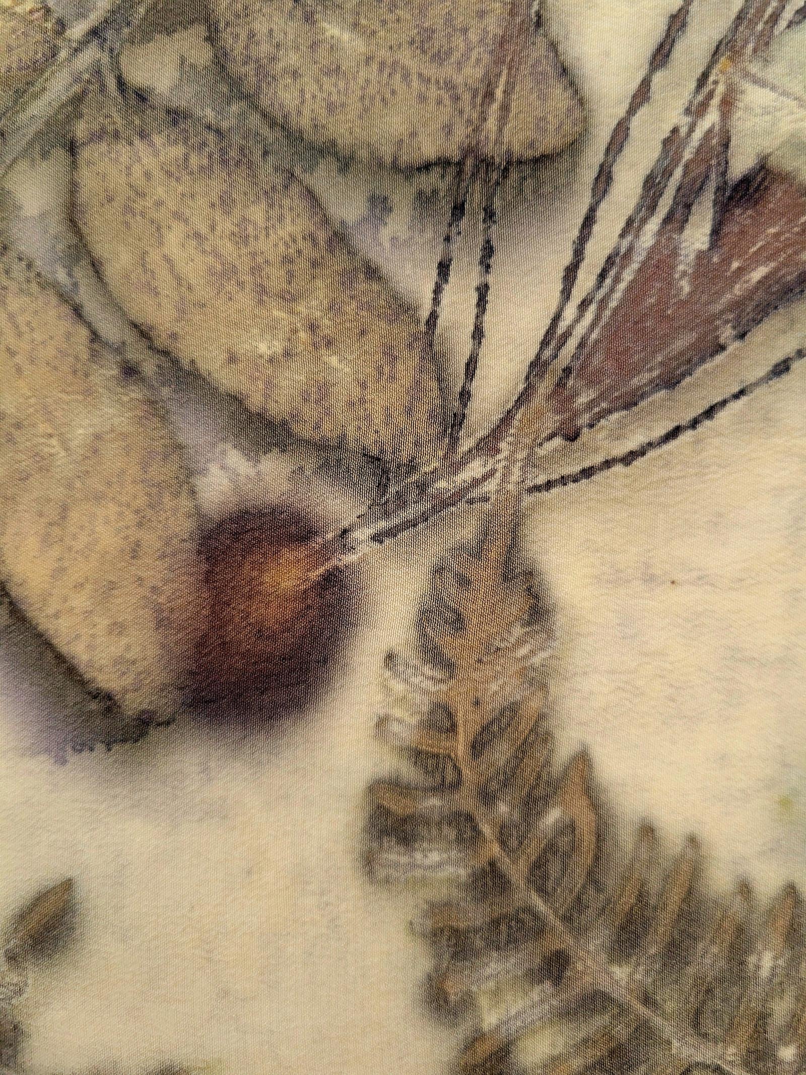 Black and tan tropical wall hanging (detail)