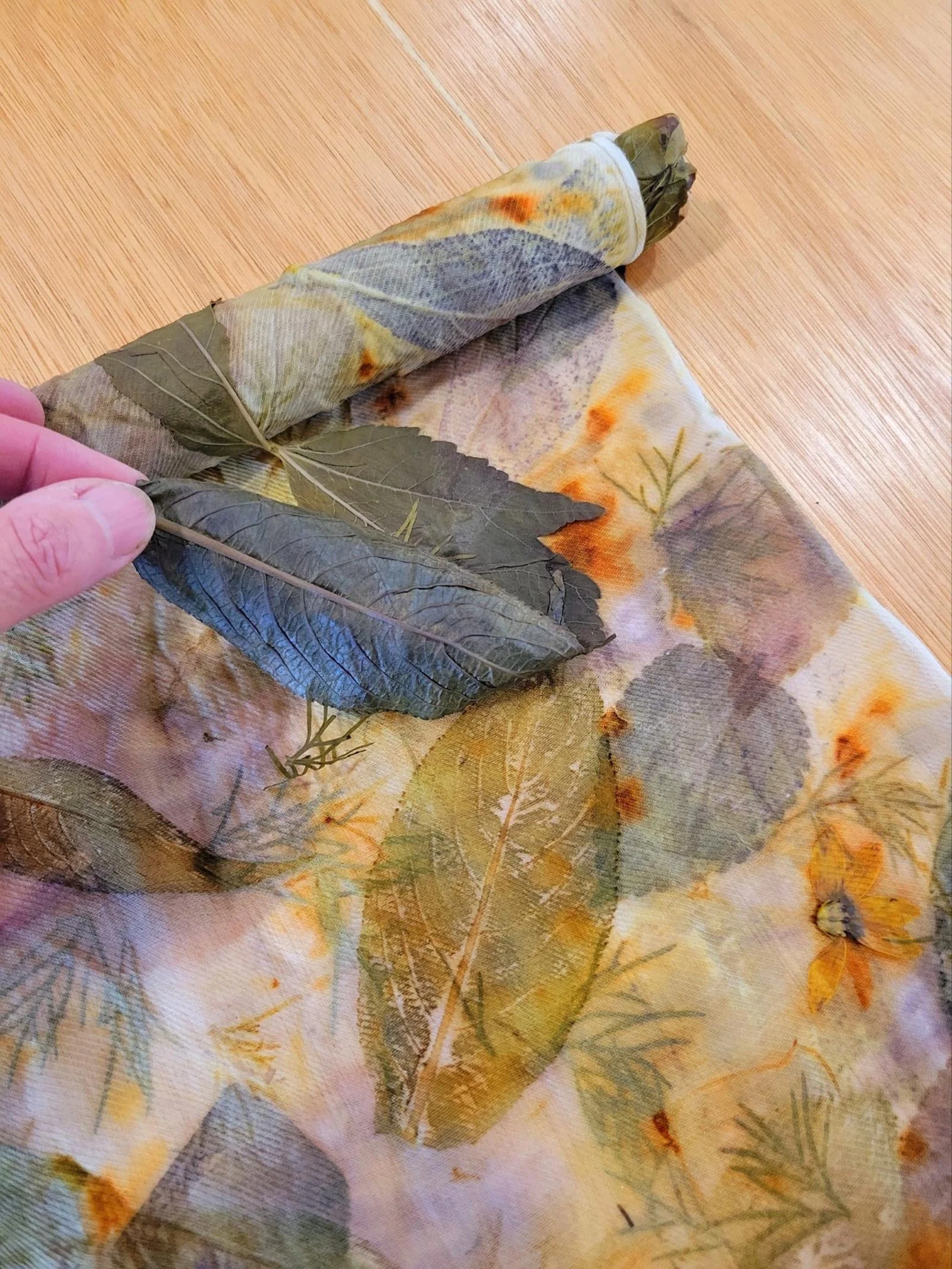Unrolling the dyed fabric