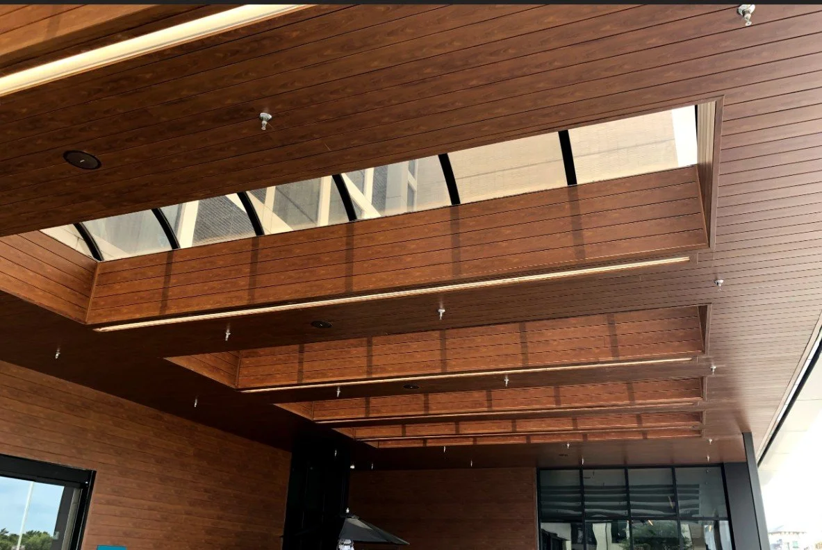 Knotwood soffit cladding on a building