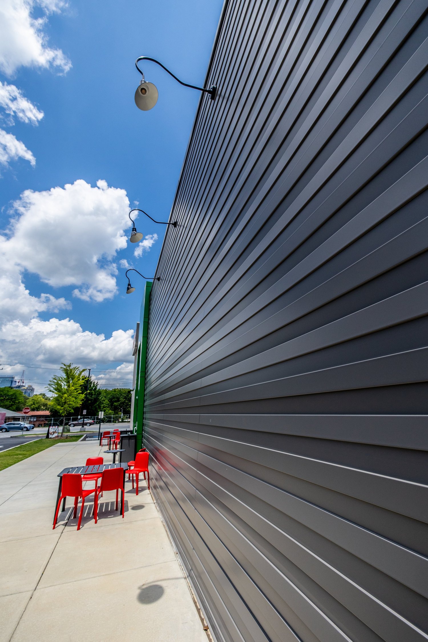 Corrugated metal panel installation