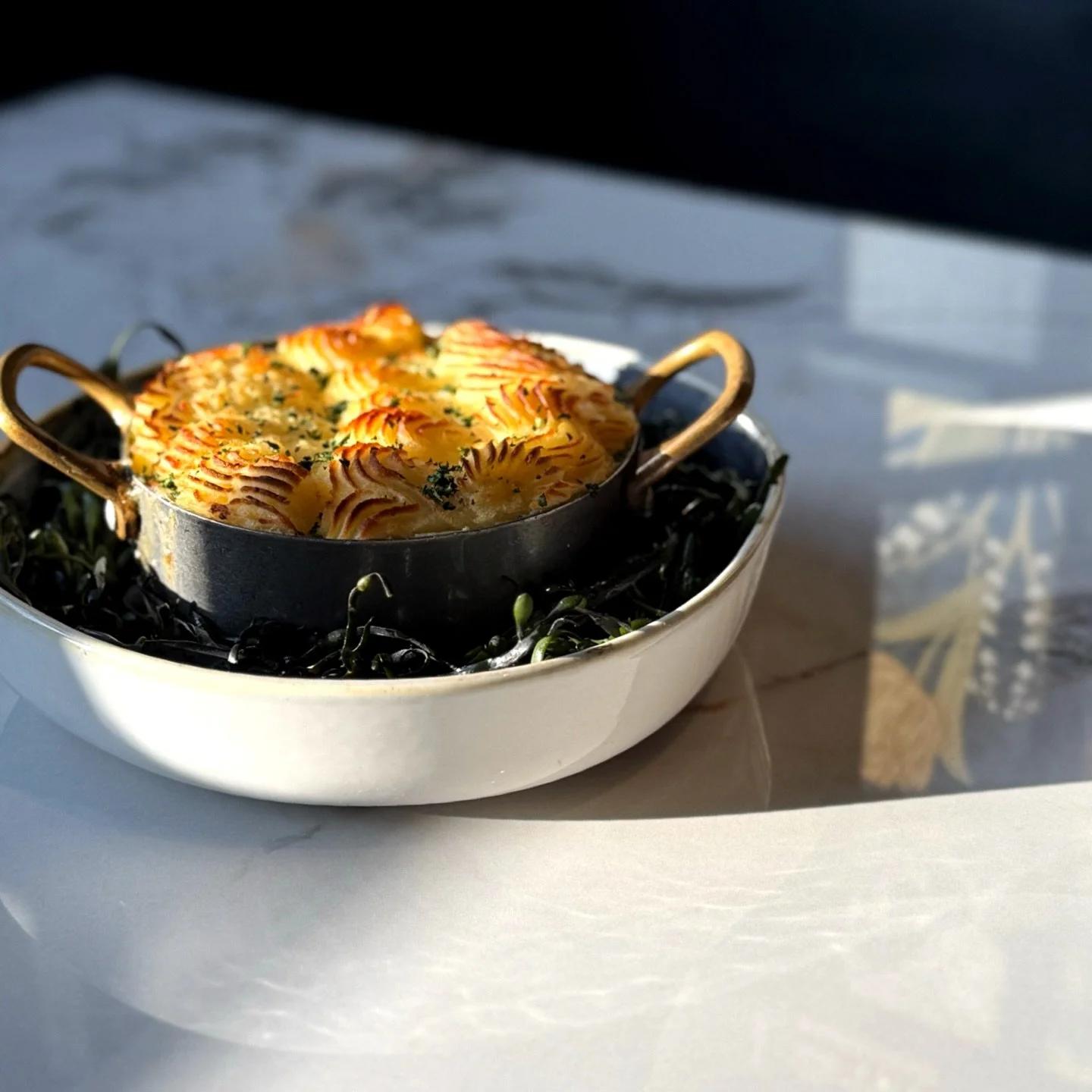 When winter hits Michigan like this, comfort food just makes sense❄️

This week&rsquo;s special: Fisherman&rsquo;s Pie &mdash; layered with flaky seafood, a creamy herb sauce, and golden mashed potatoes. Warm, rich, and perfect for days like today🐟✨