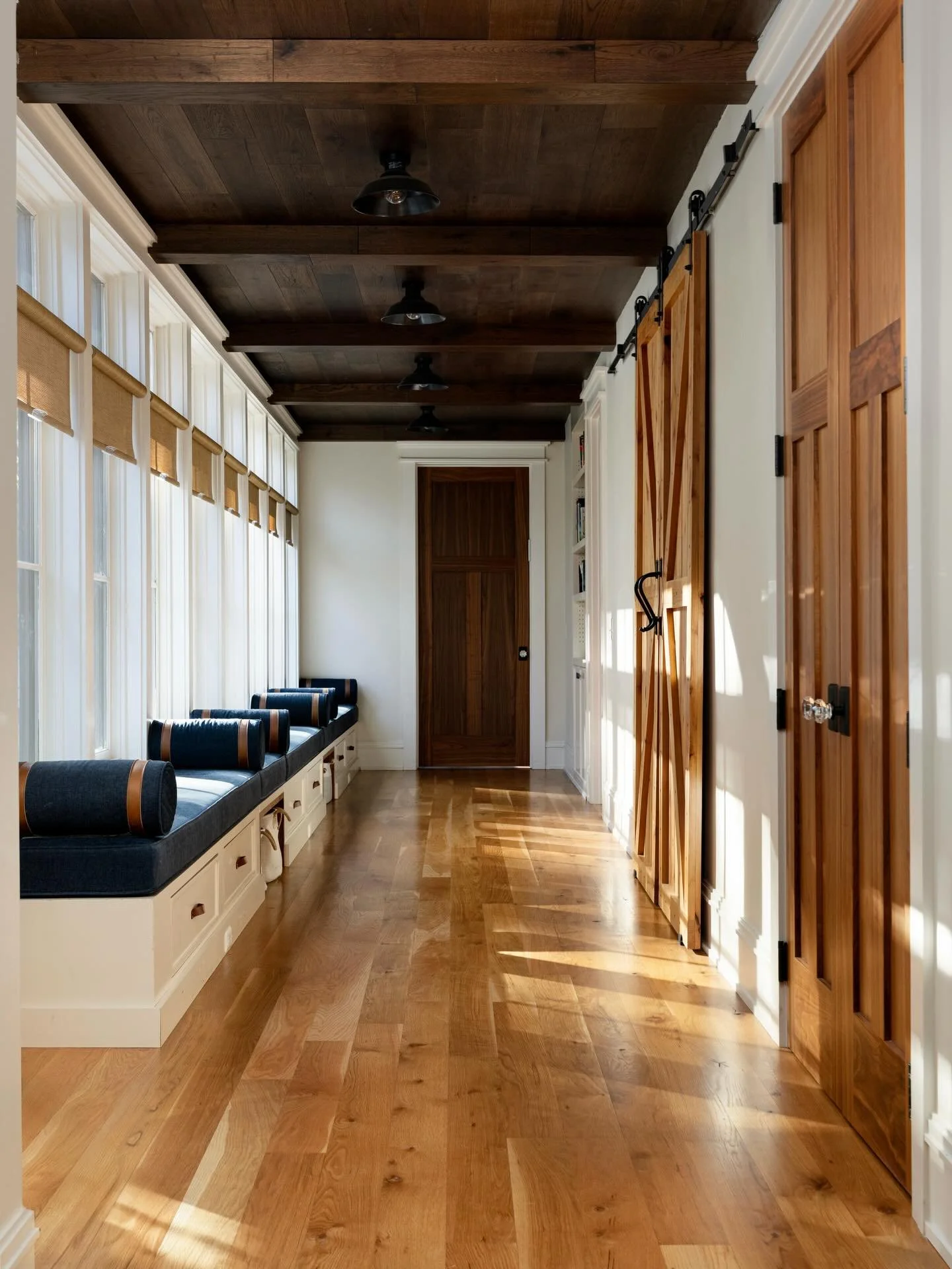This hallway just speaks to me.

Something about the farmhouse warmth, the wood tones, the quiet stretch of light on the floor.

The sun broke through for a moment and lit it up exactly the way it should be.

One of the most beautiful hallways I&rsqu