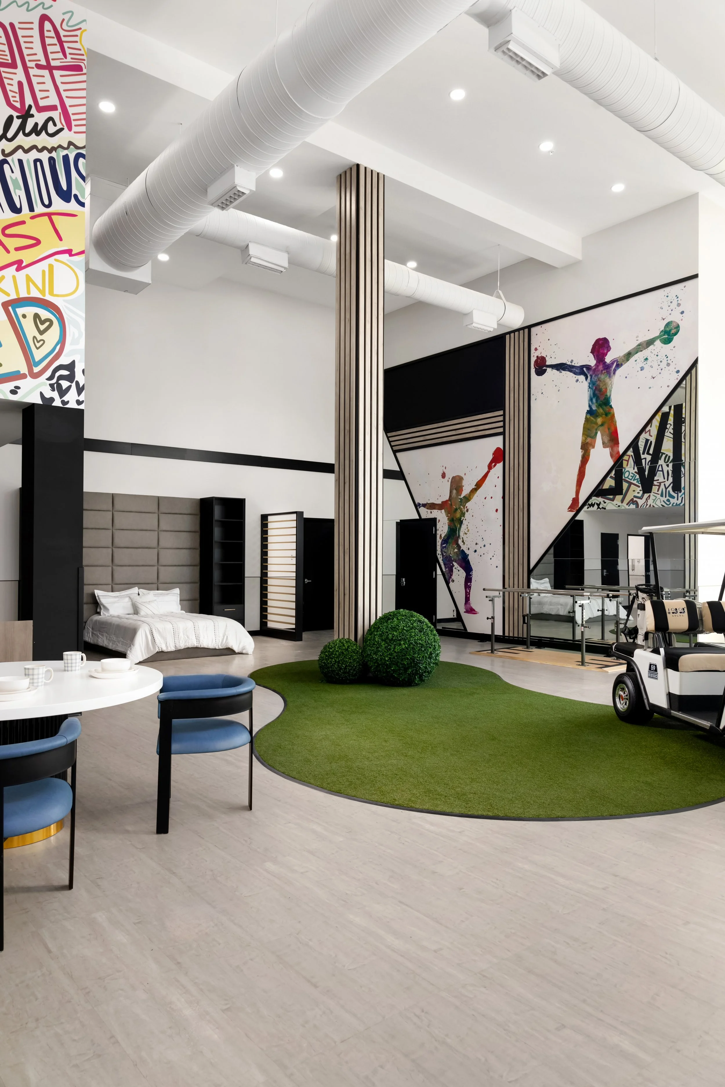 Photograph of innovative nursing home gym with vibrant art and open floor plan