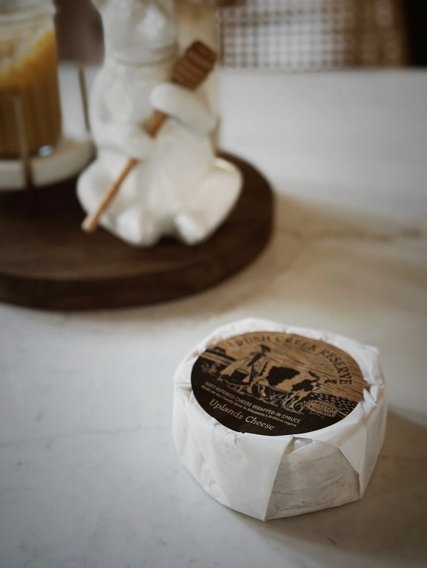 Delight is everywhere-Like this little round of Rush Creek Reserve from @uplandscheese that finally was released this fall. 
I made some slices on top of this beautiful cheese and stuffed it with garlic slices, shallots &amp; fresh rosemary. Doused w