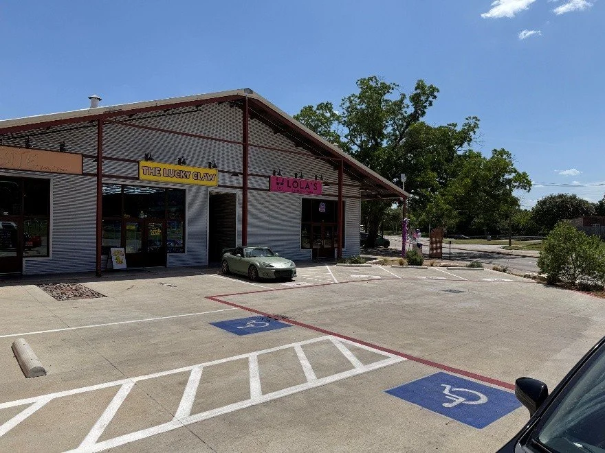 Triangle parking lot to suites.jpg