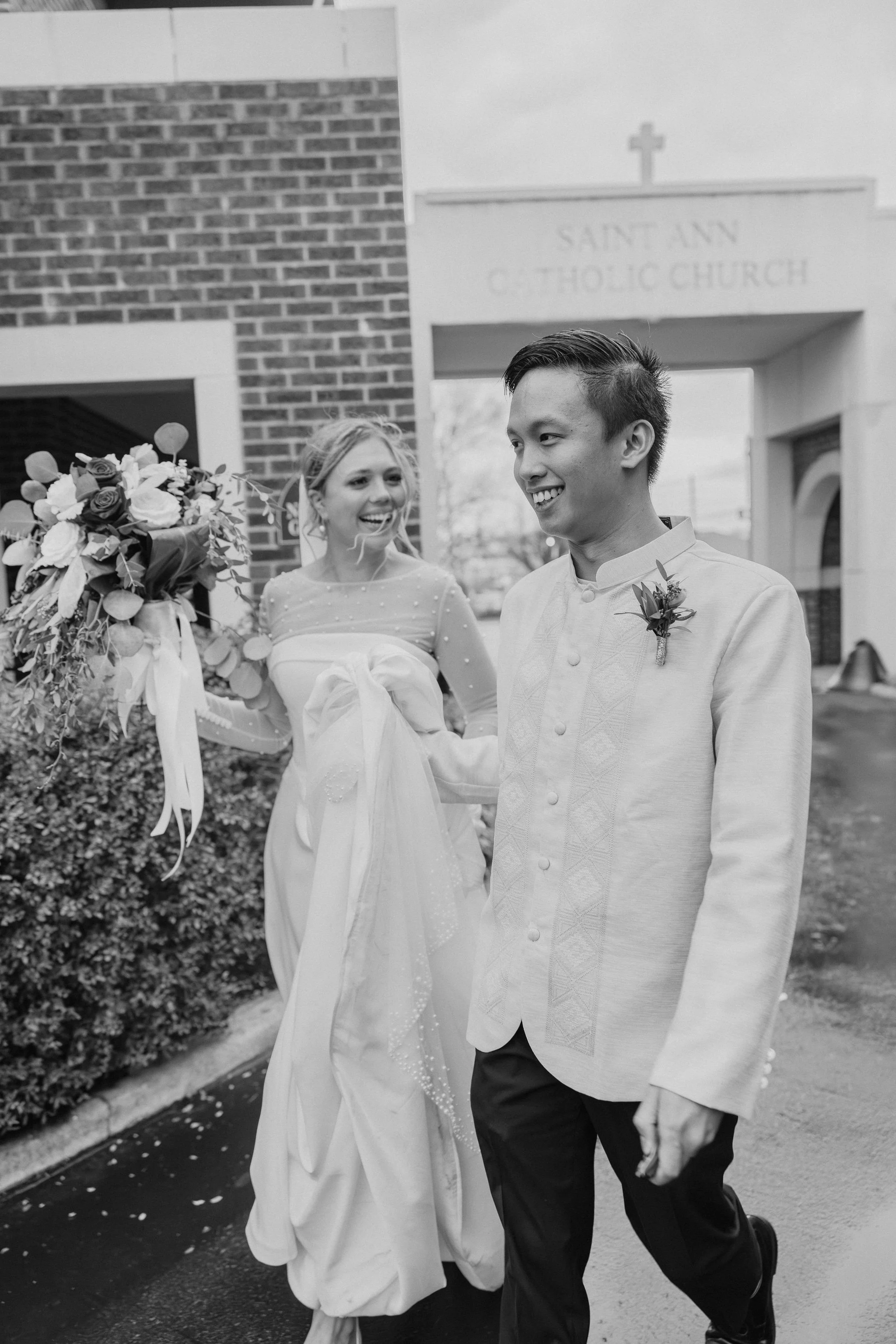 Bride and Groom joyfully exiting the church 