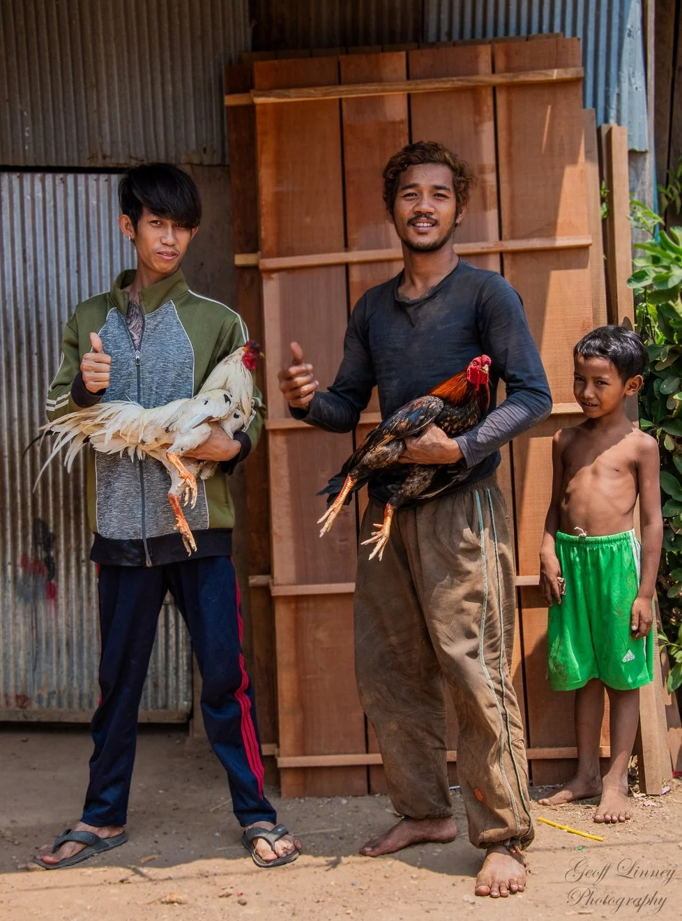 Kratie men with cocks