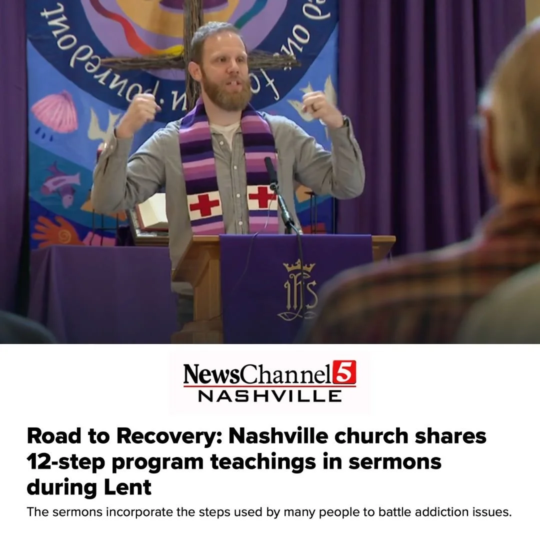 A man with a beard and gray shirt speaking at a church podium, wearing a purple Lent scarf, with a colorful church banner in the background during a church service.