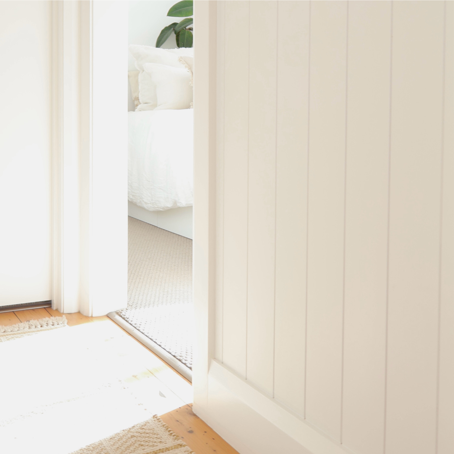 VJ Wall Panelling in sun lit hallway leading to bedroom