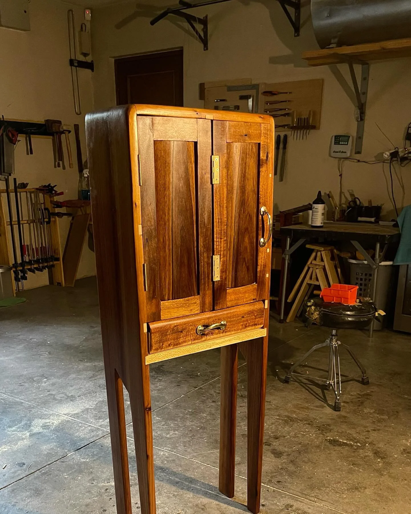 The Blackwood Bijouterie Cabinet is for sale now.

Specifically designed for jewelry, accessory, and ornamental storage.

Featuring felt lined drawers, folding double doors, brass hardware and shelving space. 

Made from Superior Grade Blackwood from