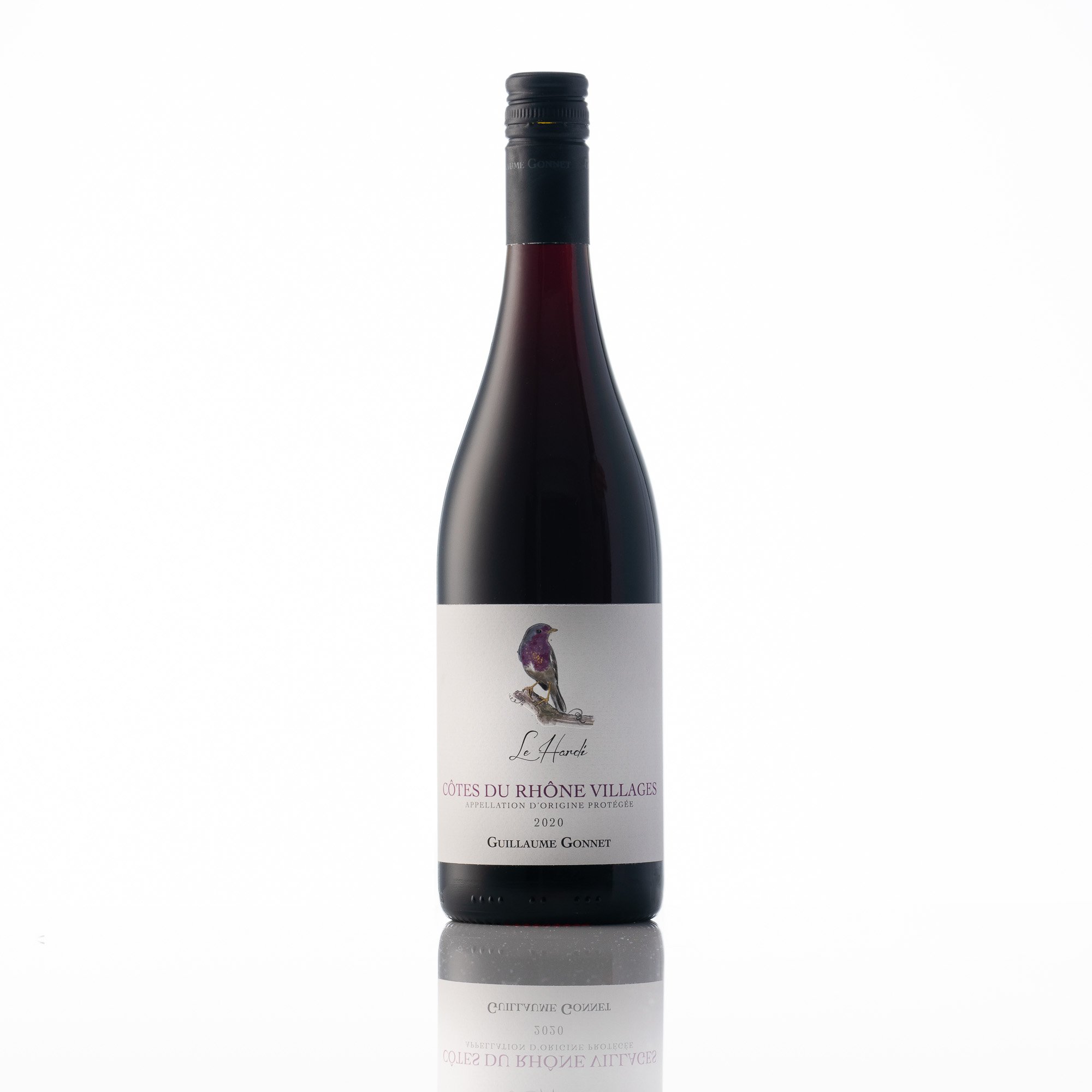A wine bottle with a white label featuring a bird illustration and the text "Le Hardy" and "Côtes du Rhône Villages"