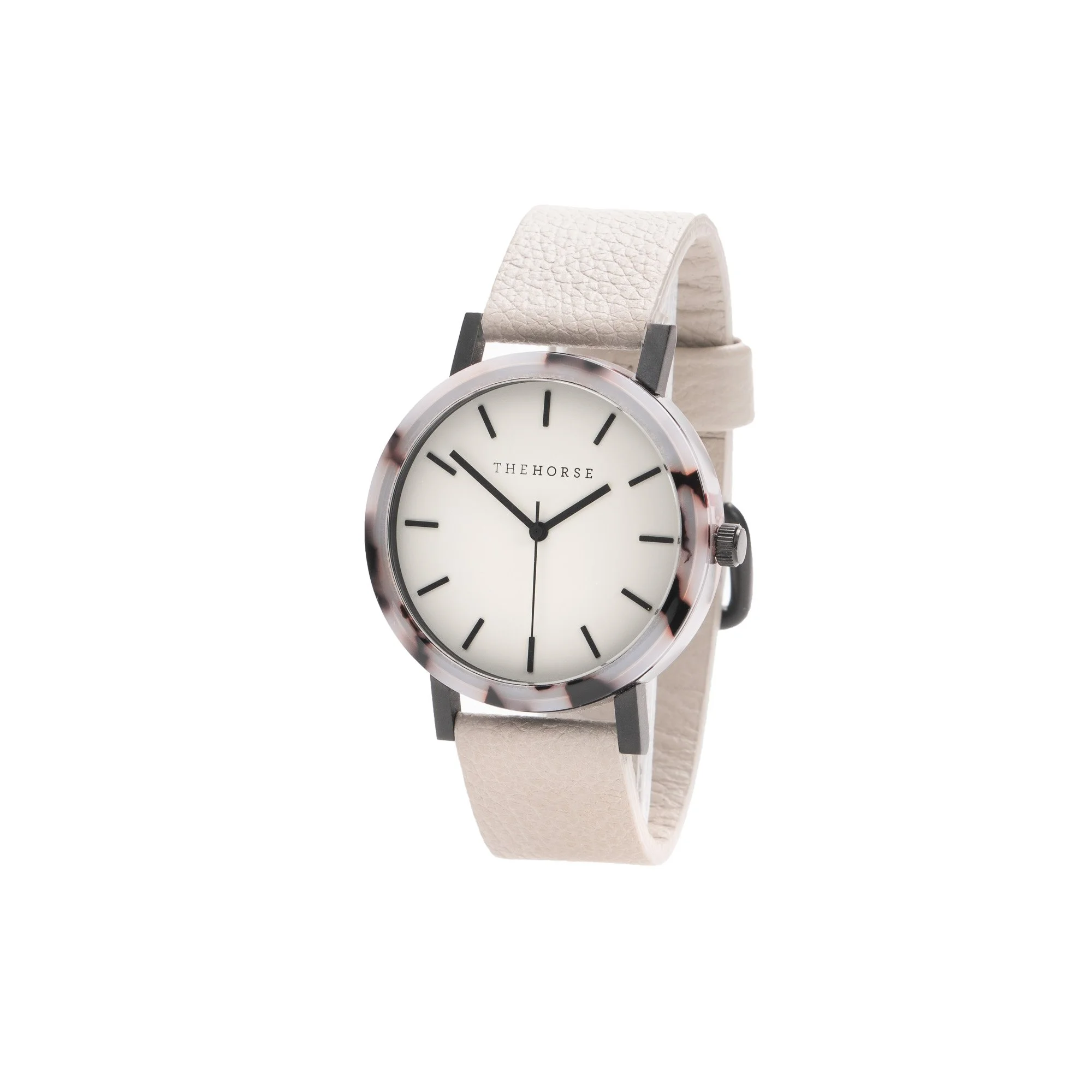 A wristwatch with a white leather band and a round white face with black minute and hour marks, and black hour and minute hands, displaying the time as approximately 10:50.