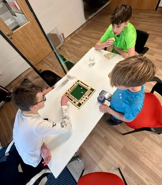 SEND learners playing one of our many maths games, shut the box