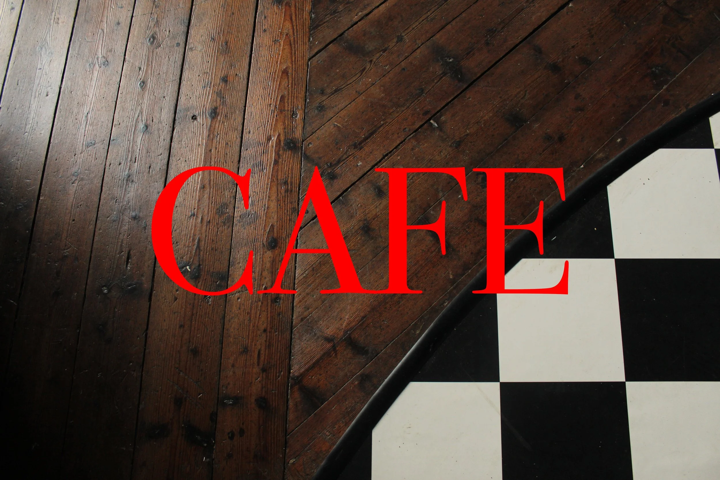 Wooden floor and black-and-white checkered floor with the word 'CAFE' written in red.