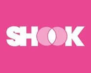 Pink background with the word 'SHOK' in white, stylized with the 'O' split into two halves.