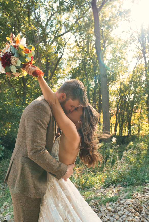 Couple Kissing during a wedding video