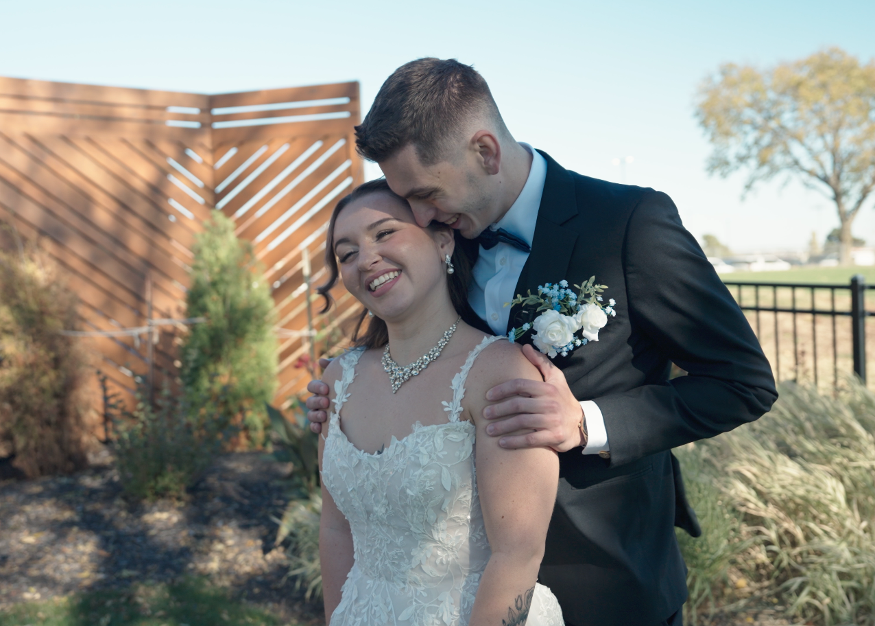 Couple sharing moment together at an outdoor wedding in Omaha, Nebraska