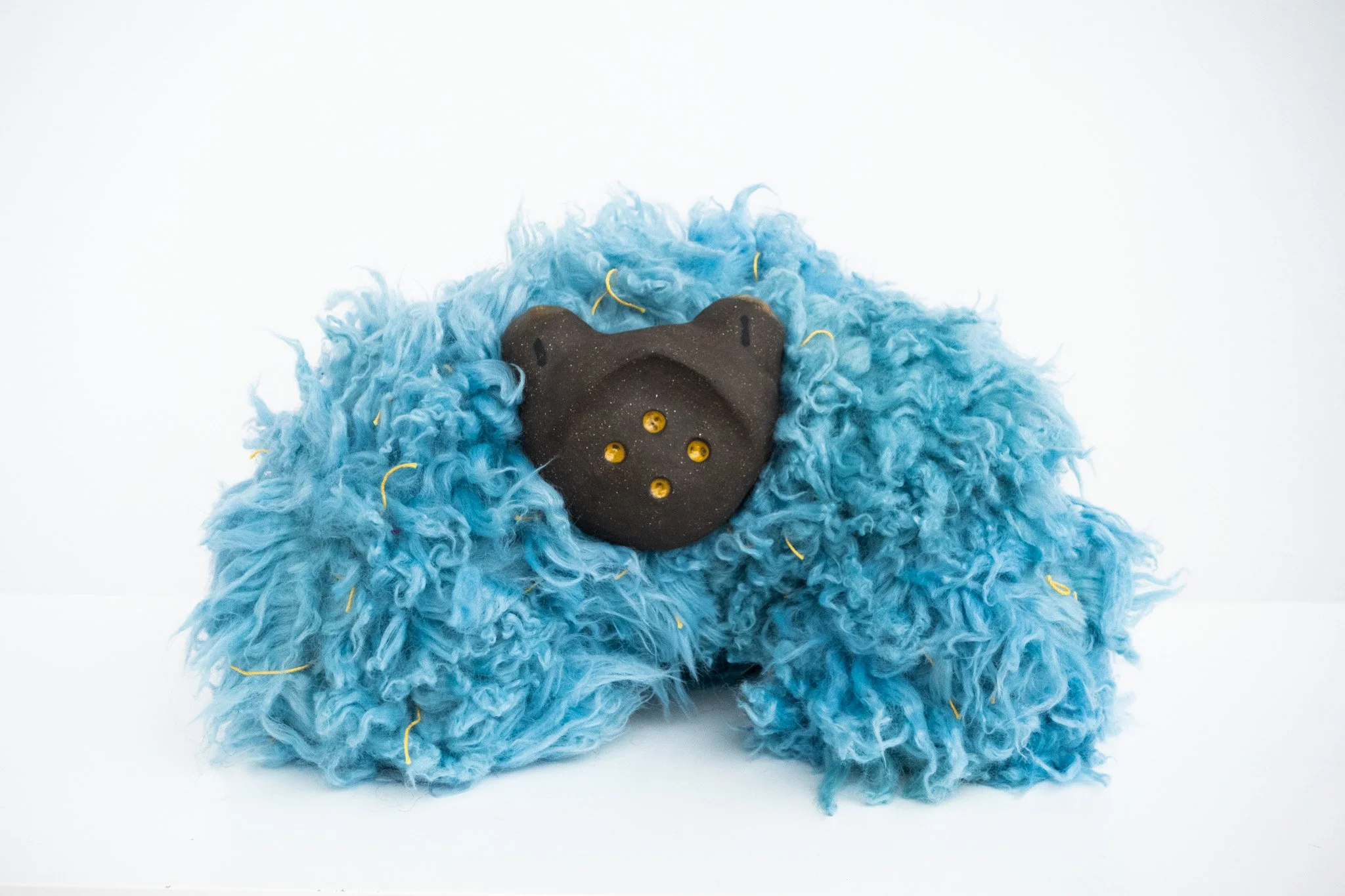 frog, 2026, ceramic and dyed synthetic fabric