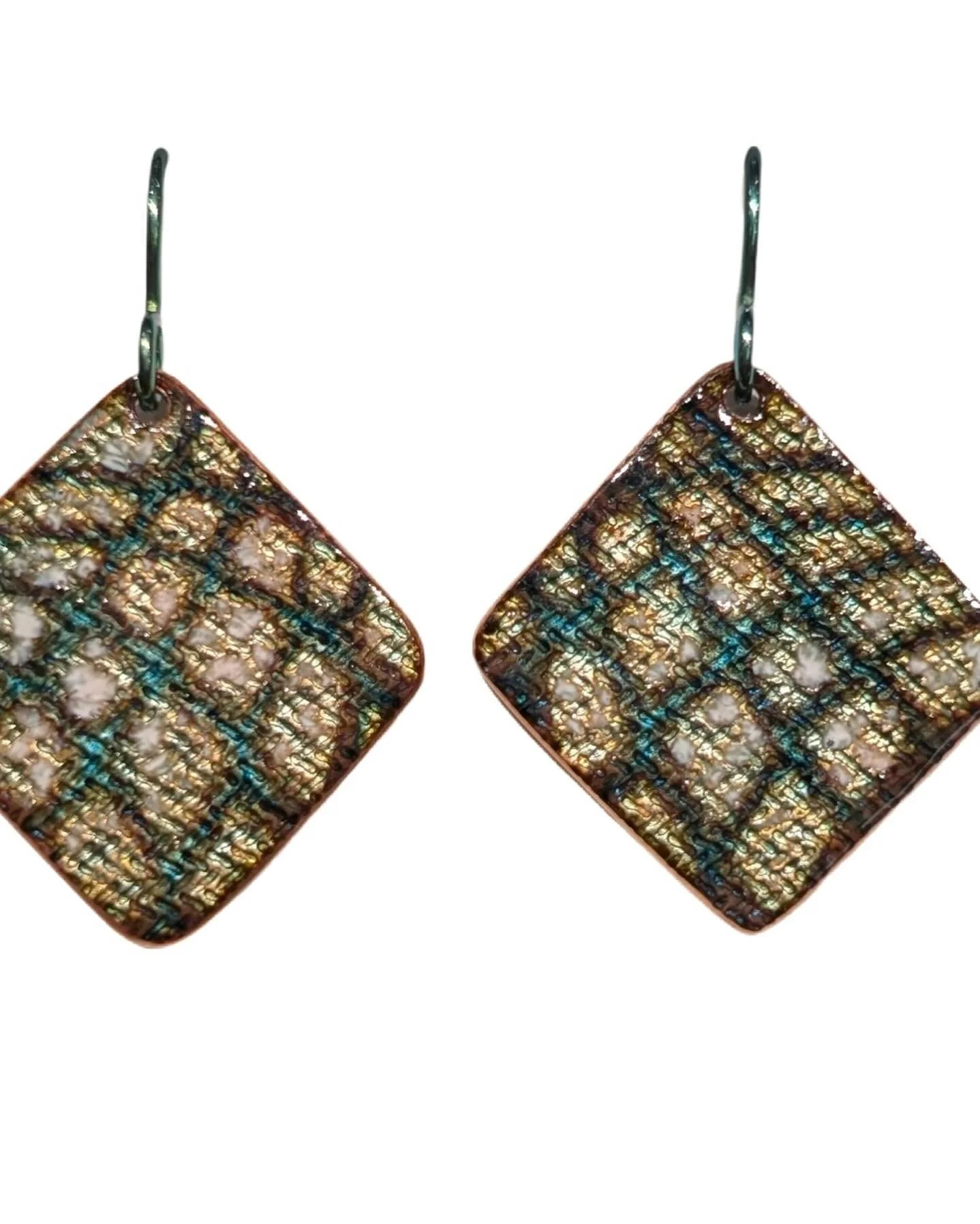 Texture and color combine for a striking effect! Earrings by gallery member Tina Chisena.