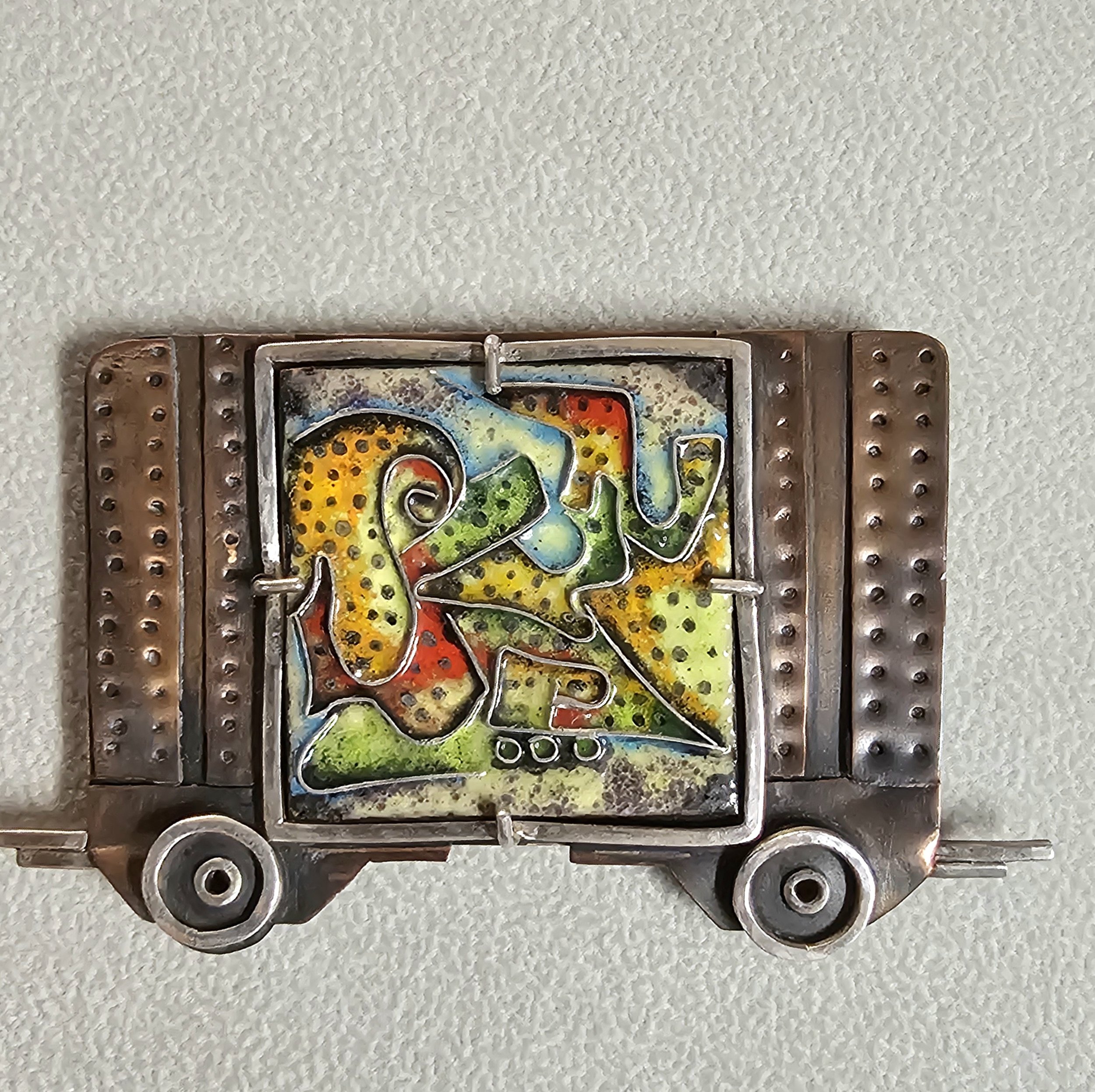 Box car brooch, with cloisenne graffiti
