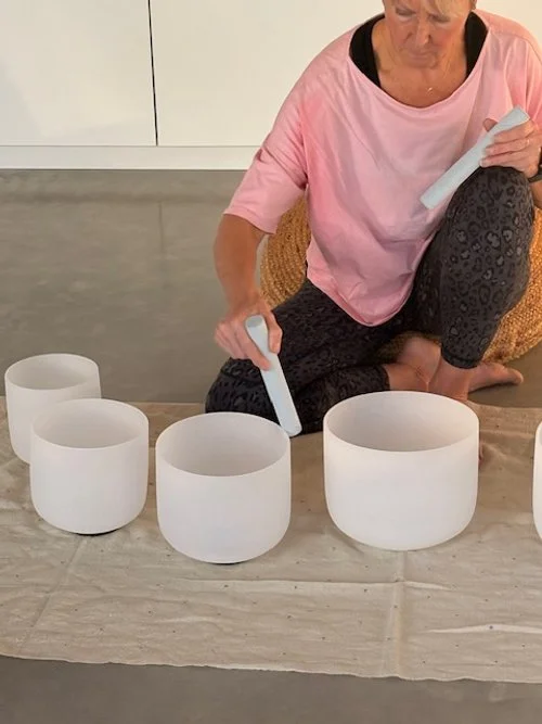 Charlotte from my oke yoga playing Crystal Singing Bowls