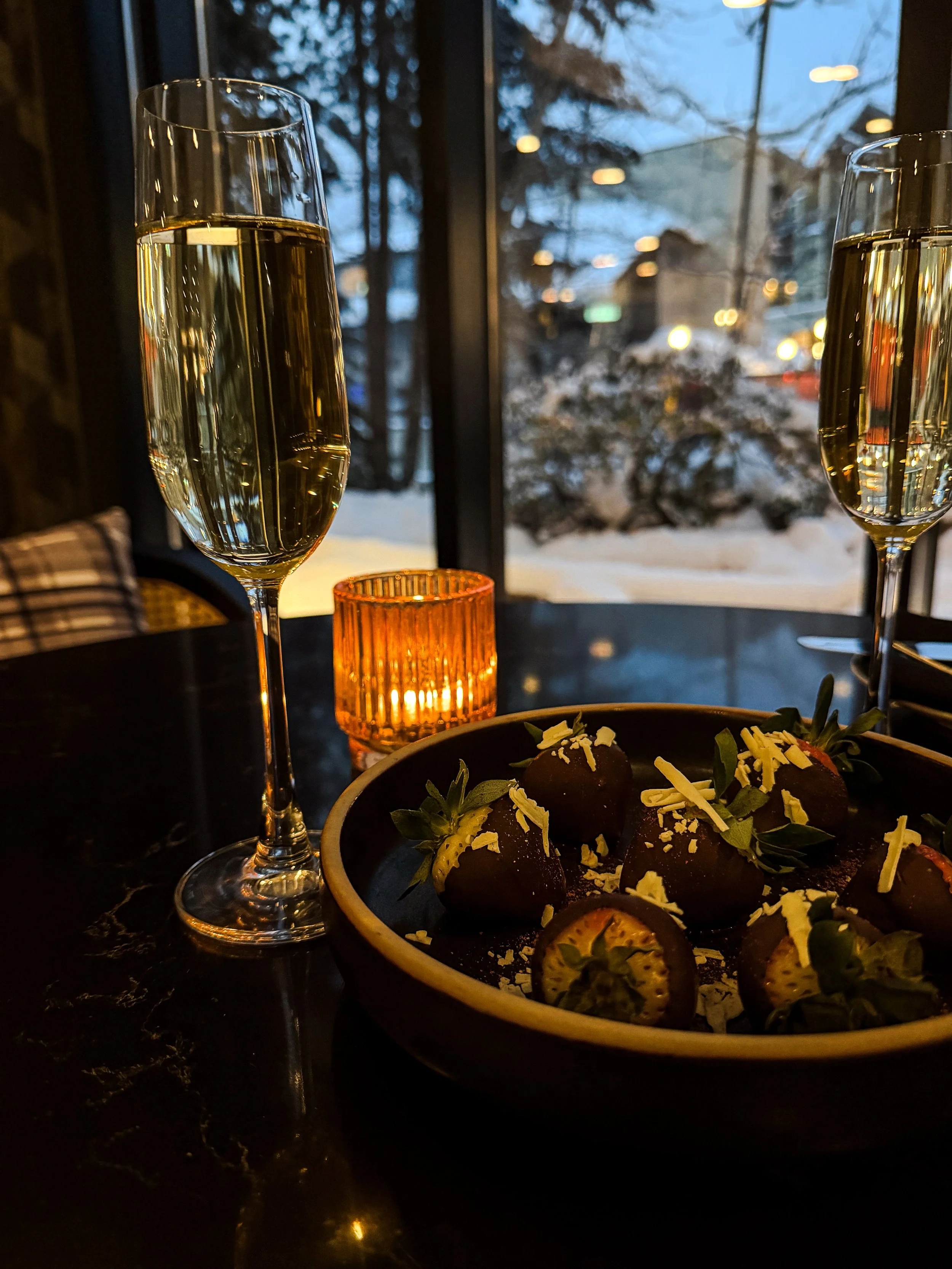 Evening Dining with Champagne and Winter View at Resort.jpg