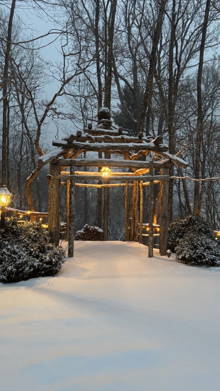 A rustic pergola photographed during winter 2024, Boone, NC