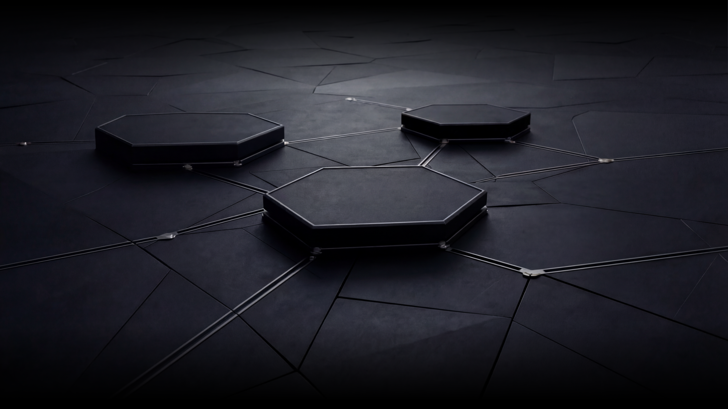 Close-up of interconnected hexagonal and pentagonal tiles on a dark surface, resembling a futuristic or board game layout.