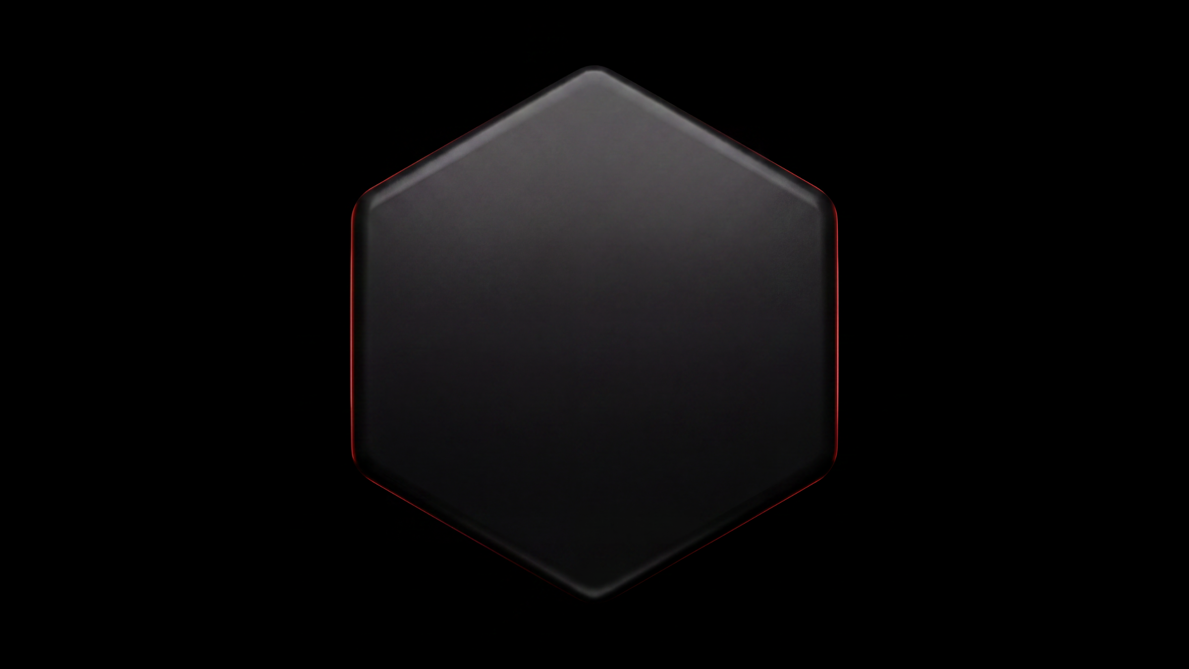 A black hexagonal electronic device with red edges placed on a black background.