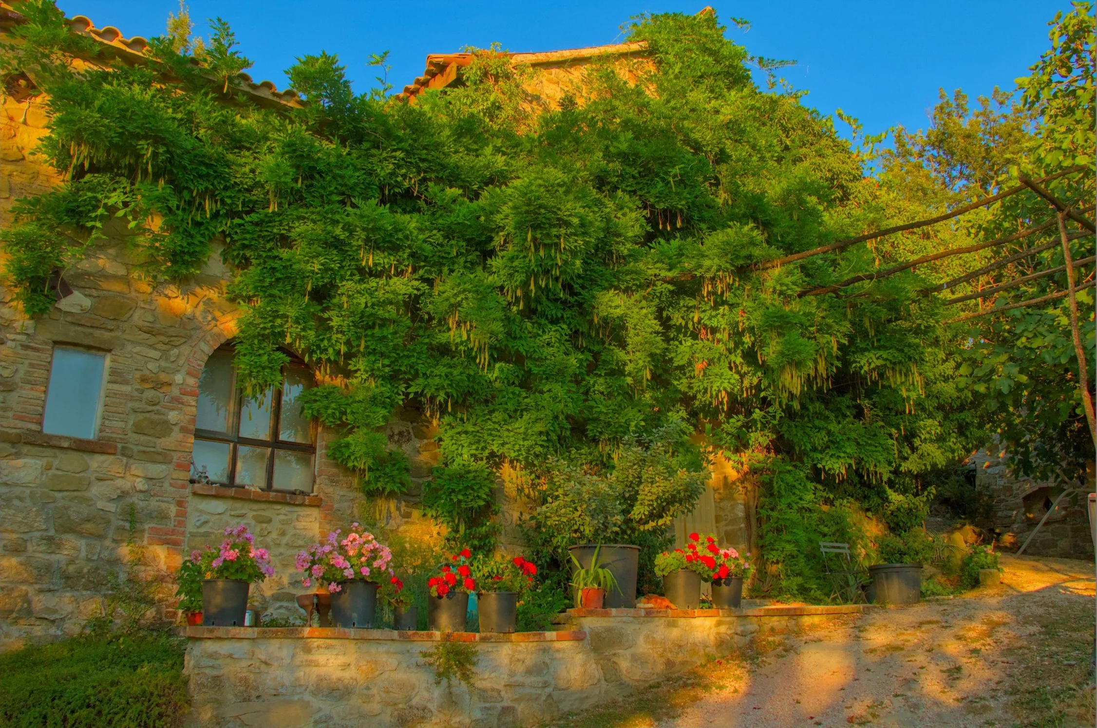 Casa Angiolina and our house on a fine Summer evening