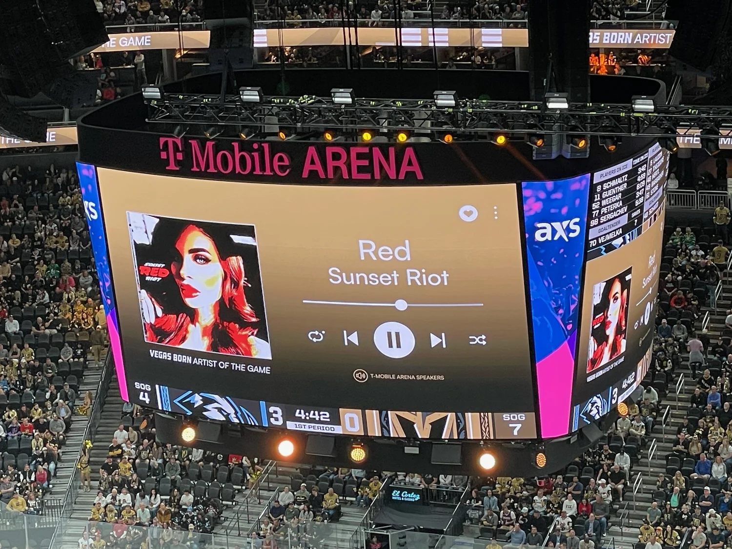 T-Mobile Arena scoreboard playing Red by The Sunset Riot