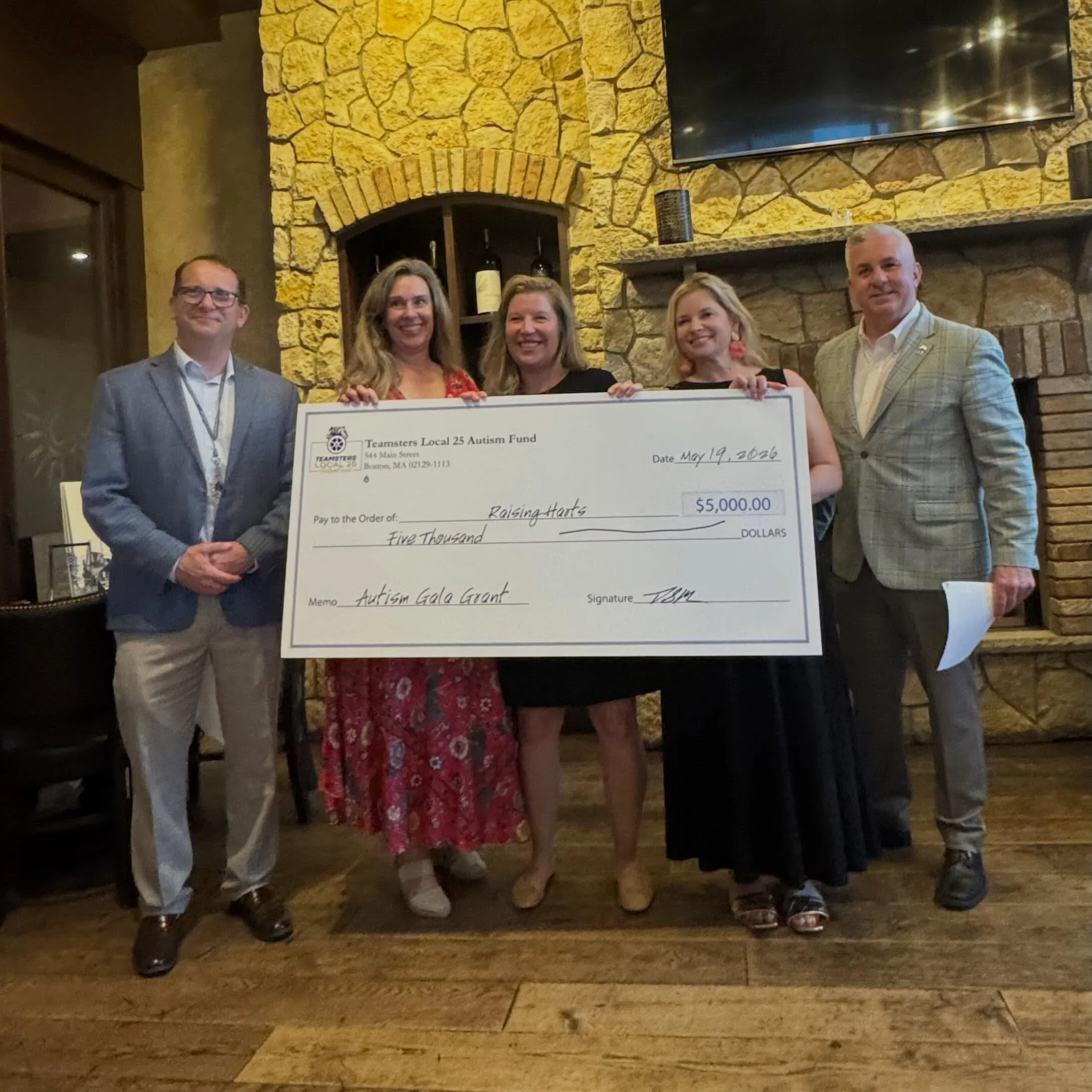 Last night was a big win for our little team. Teamsters Local 25 presented Raising Harts with a $5,000 Autism Gala Grant, oversized check and all!

As a growing nonprofit doing big work with a small (but mighty 😉) crew, support like this genuinely m